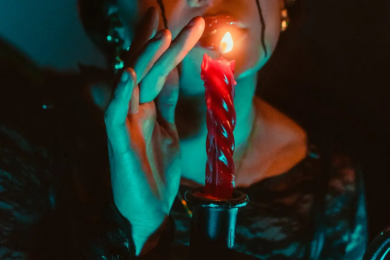 candle magic woman holding color magic candle